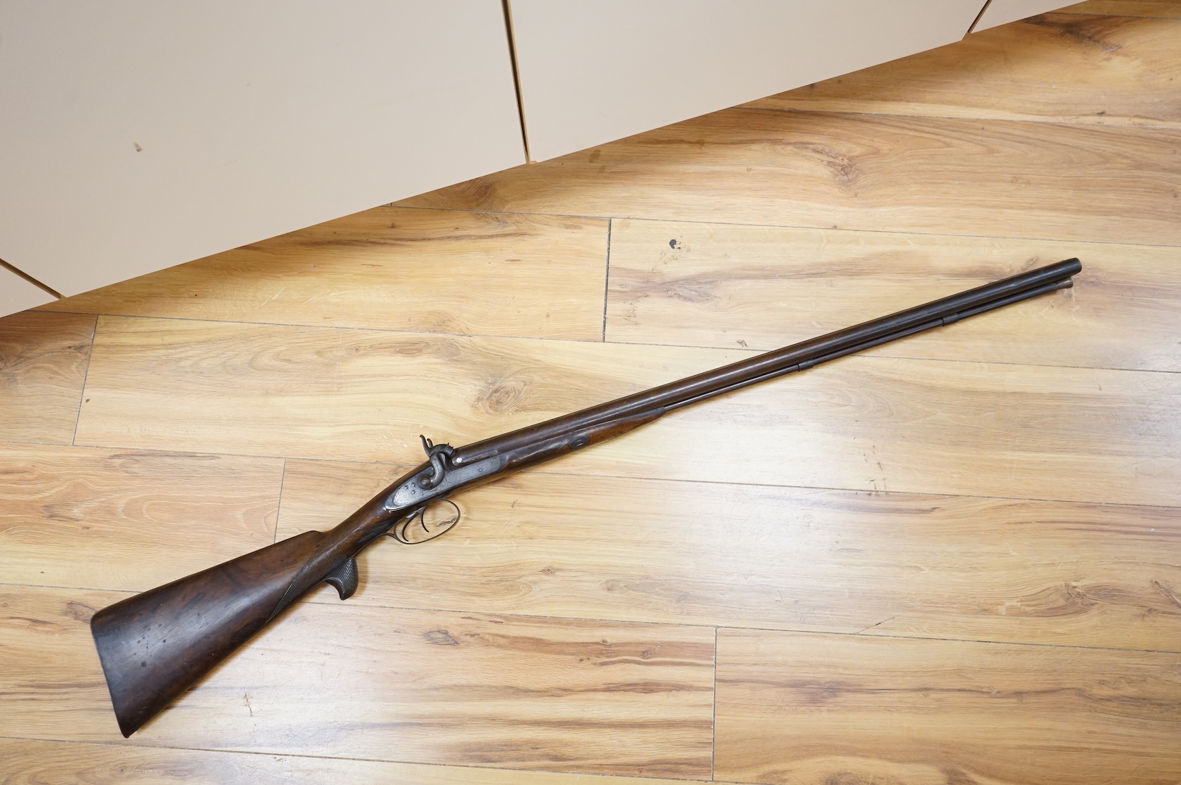 A 1907 bayonet in its scabbard with the tip of the blade shortened, together with a Glengarry cap of the KOSB, post 1902 badge and a brown leather shoulder belt and pouch with QE2 bronze badge of the Royal Artillery